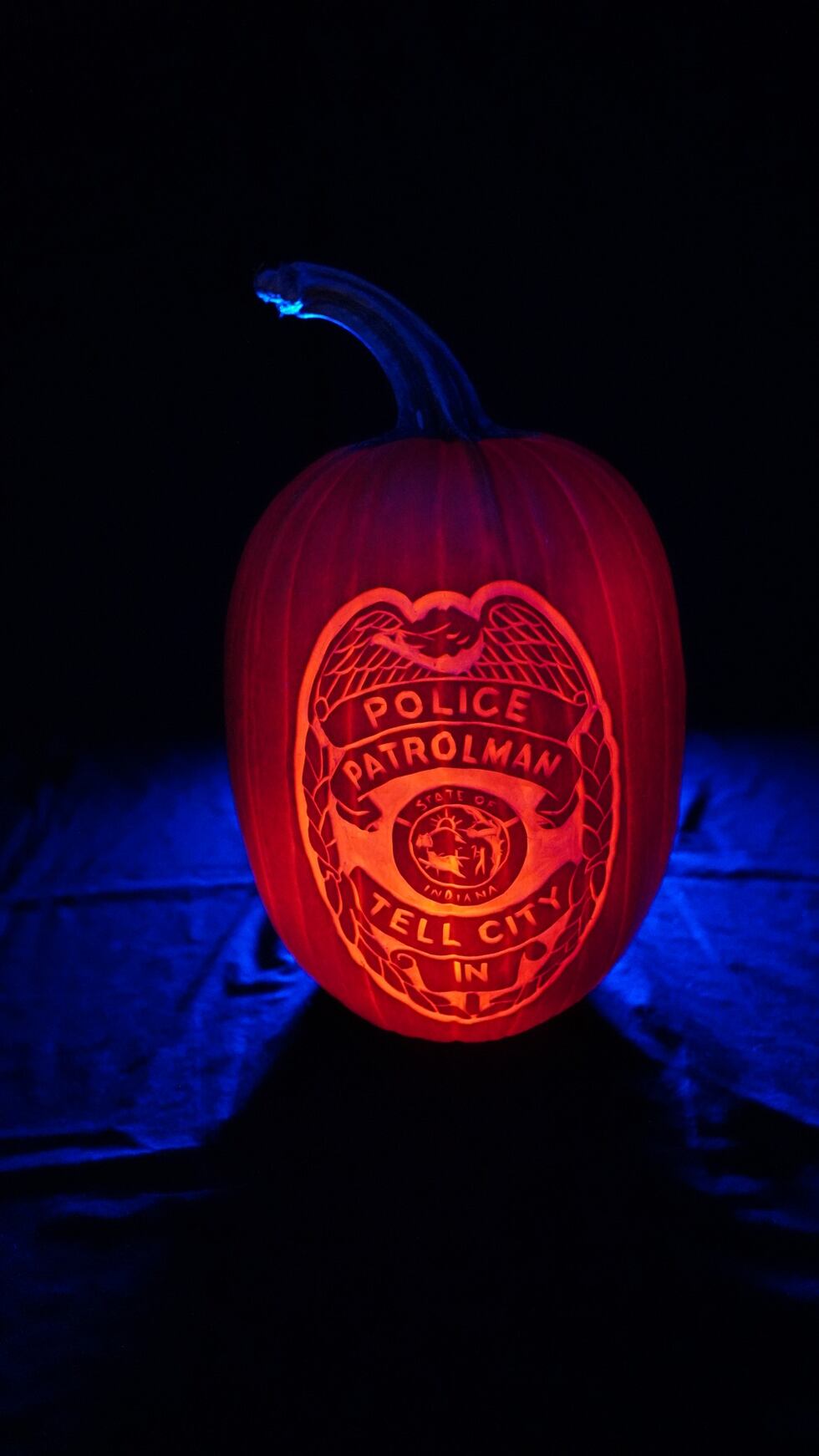 Pumpkin with Tell City Police badge in honor of Sgt. Heather Glenn