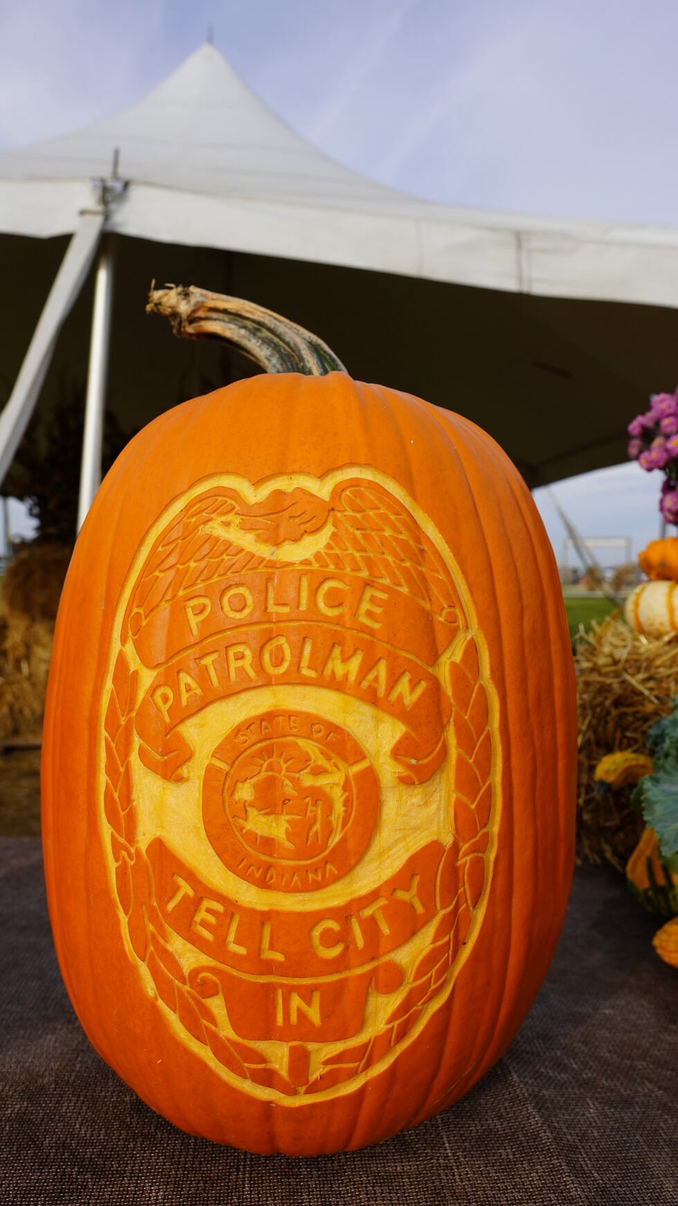 Pumpkin with Tell City Police badge in honor of Sgt. Heather Glenn
