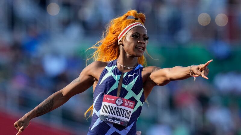 FILE - United States sprinter Sha'Carri Richardson celebrates after winning the first heat of...