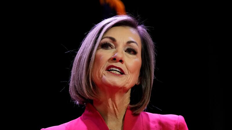 FILE - Iowa's Republican Gov. Kim Reynolds delivers her inaugural address, Jan. 13, 2023, in...