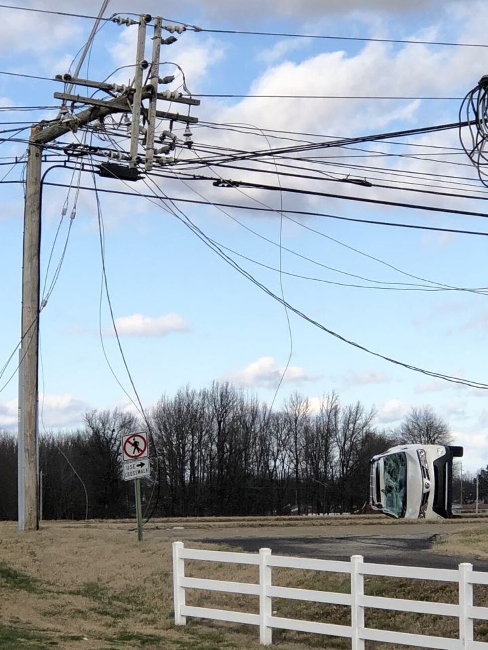 Car flipped and power pole snapped on Parrish Ave. in Owensboro