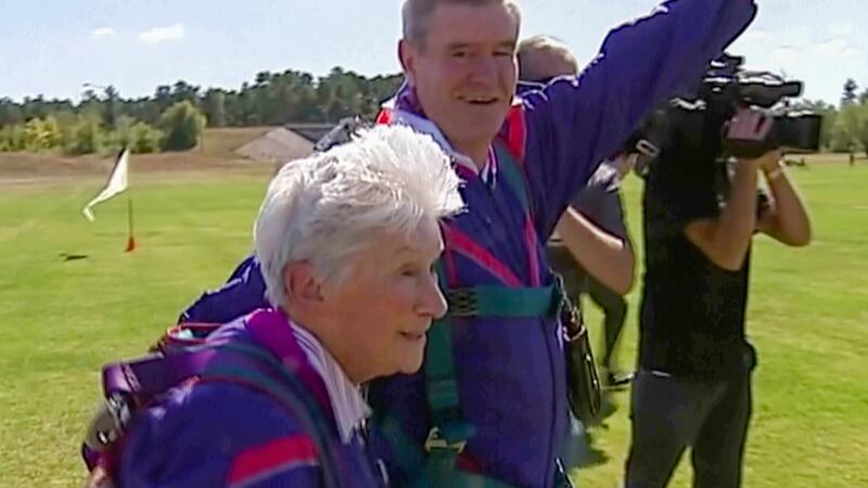 In this image made from video, Clare Nowland reacts following her skydive in Canberra,...